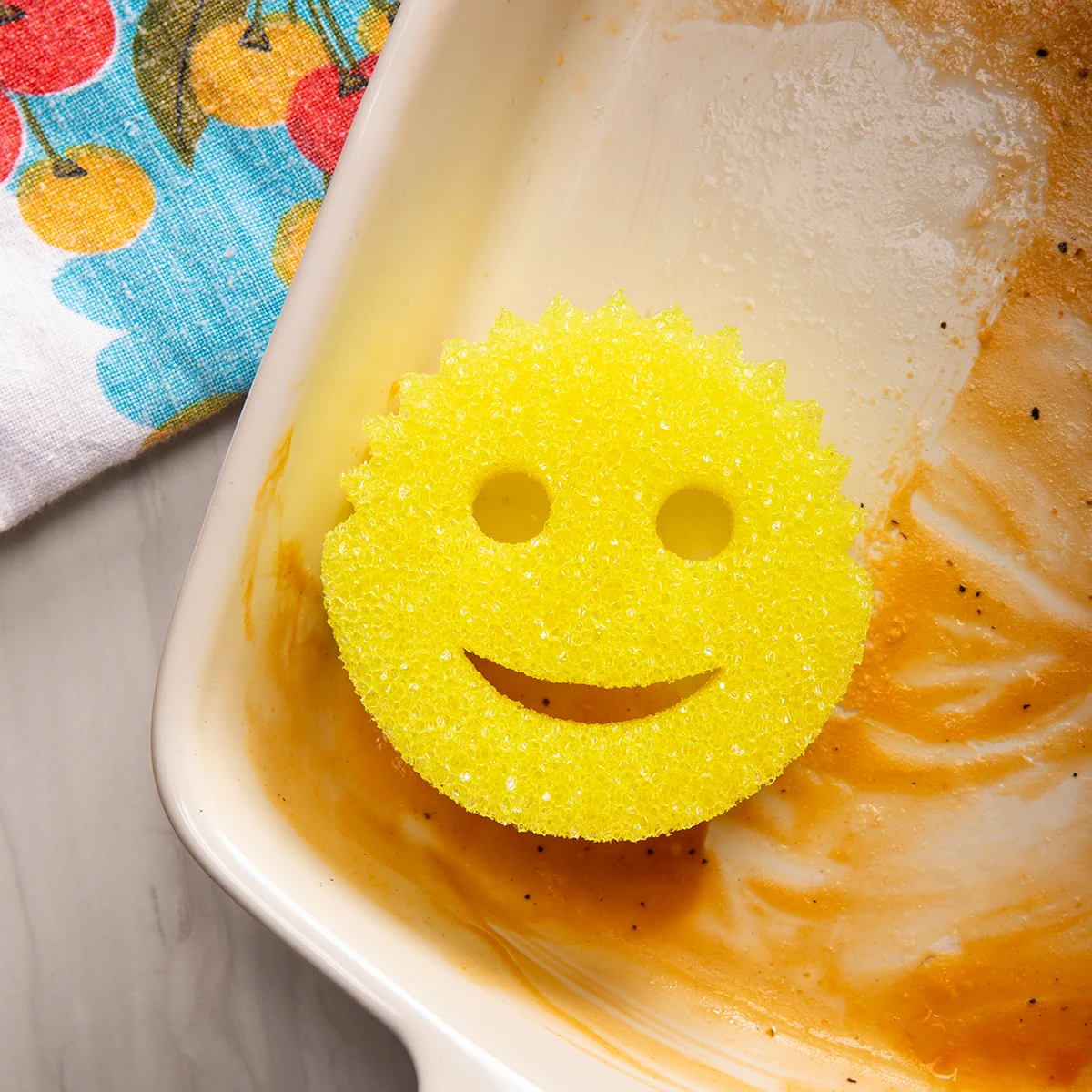 Scrub Daddy cleaning a casserole dish